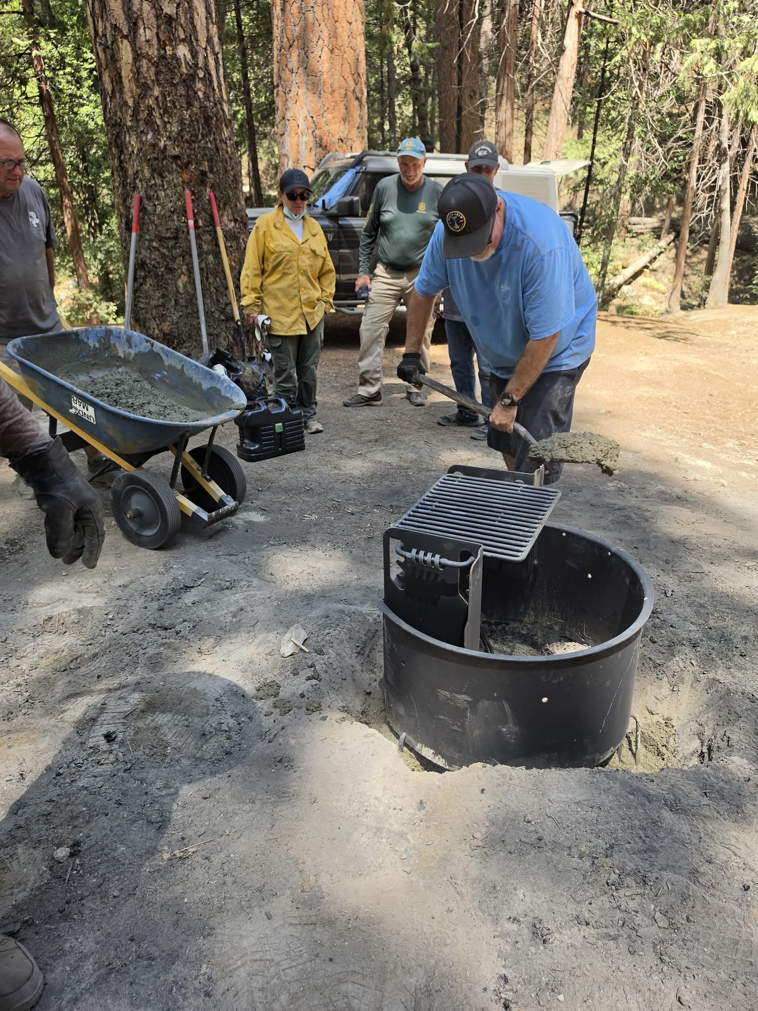 Dirty Playas volunteers replacing a fire ring during the August 28, 2026 workday.